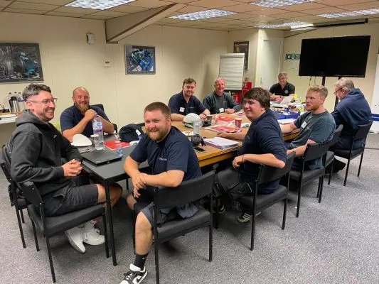 Group of men in WJA training session