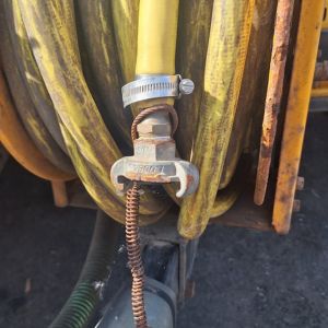 Hose coupling close up on a high pressure unit